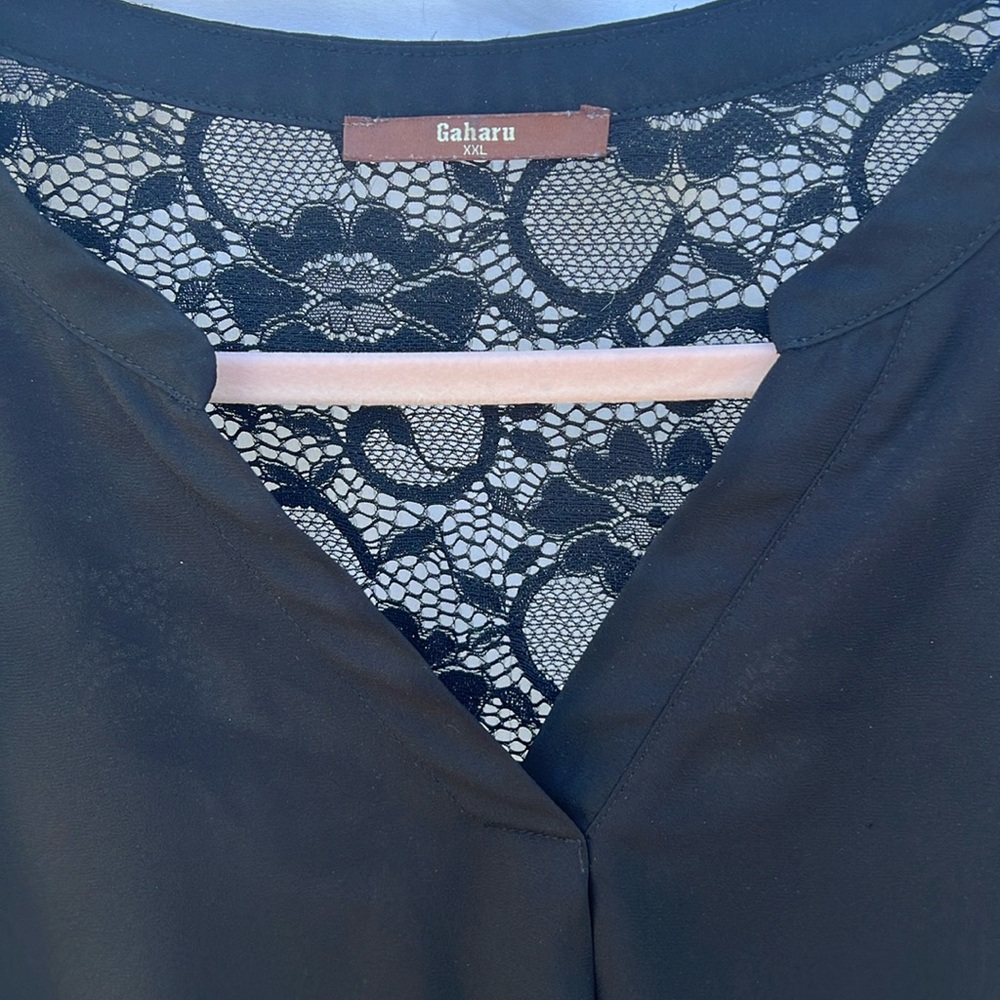 Used short sleeve black lace top, solid bottom. Size xxl